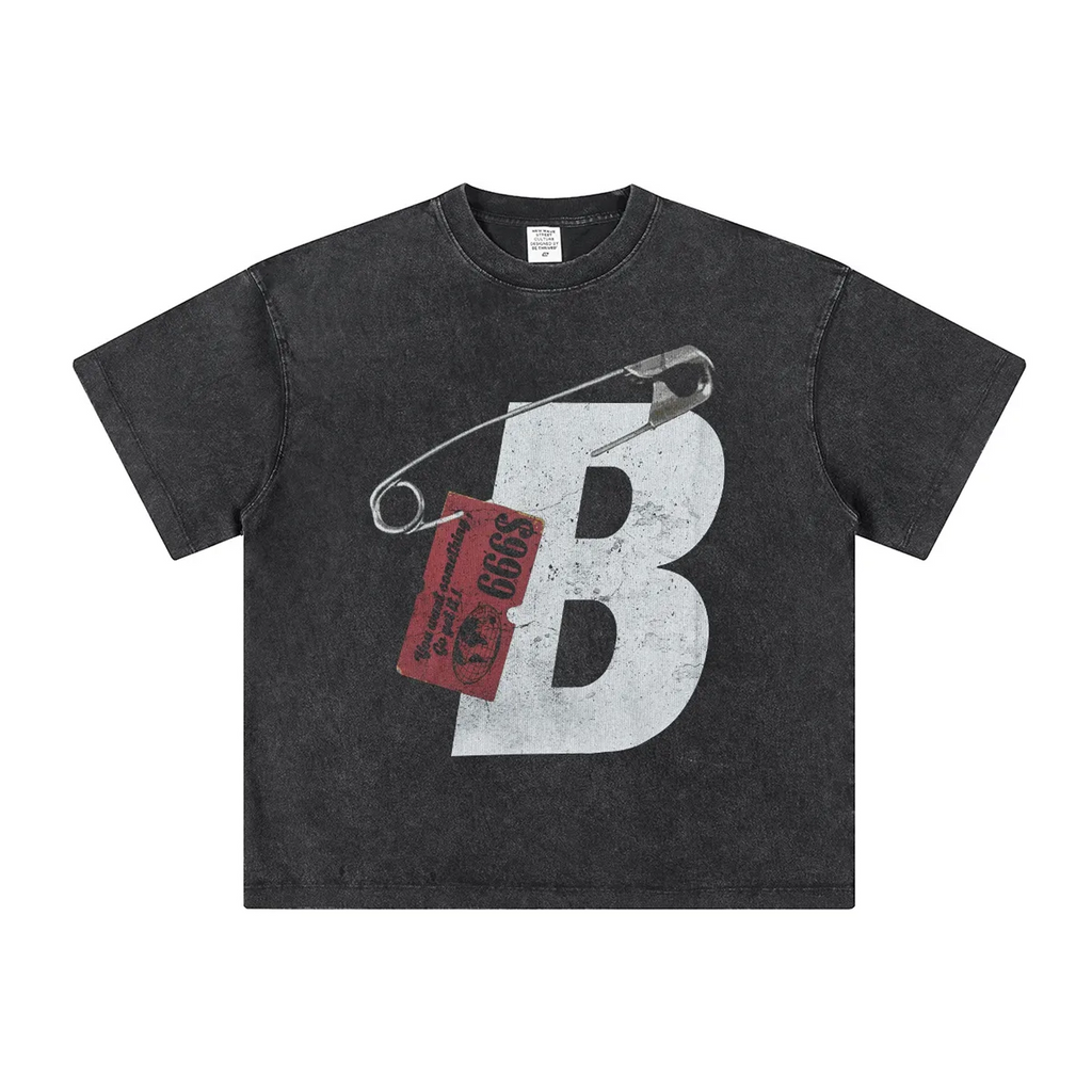 Black t-shirt with graphic design featuring a large 'B' and a safety pin on a white background