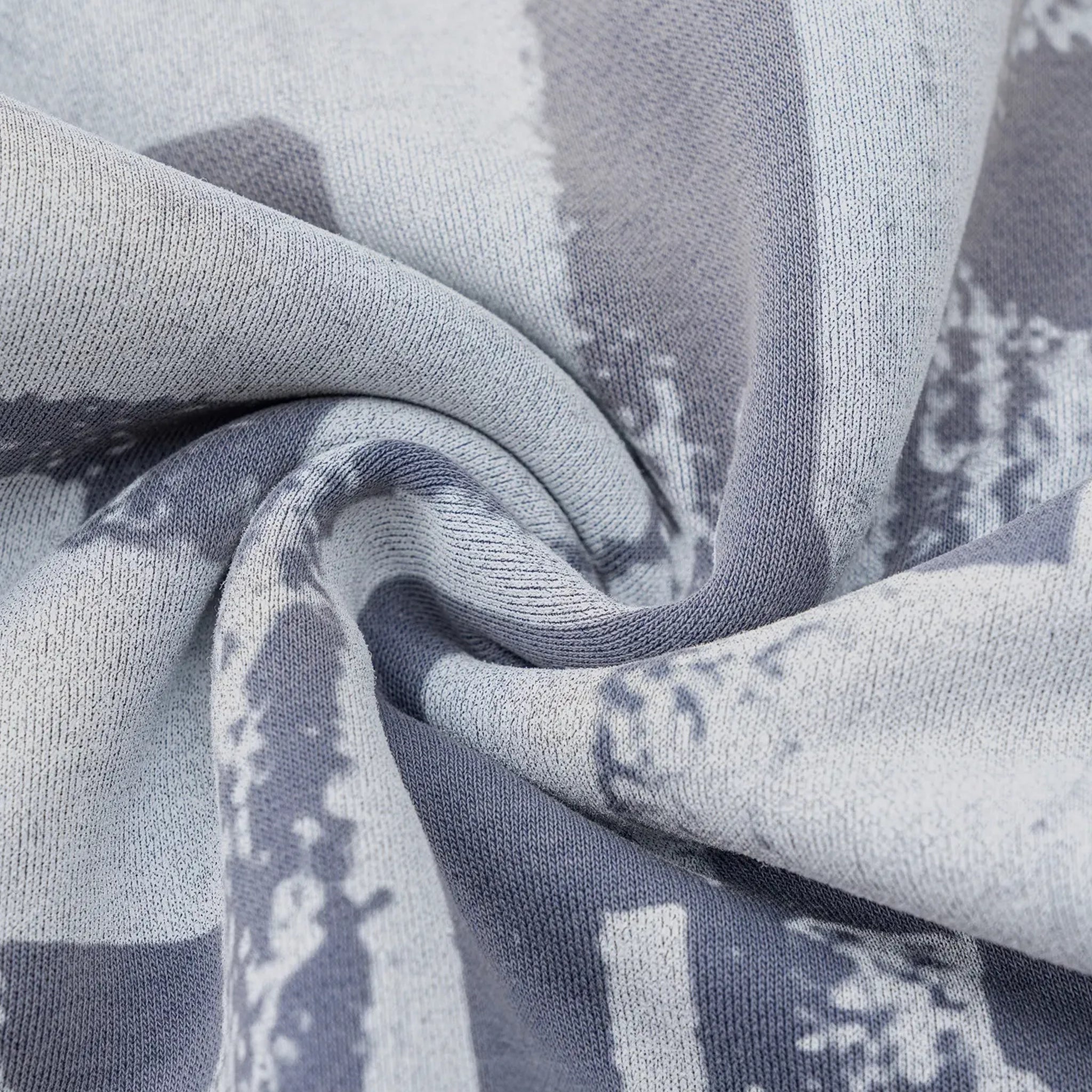 Close-up of gray fabric with subtle pattern