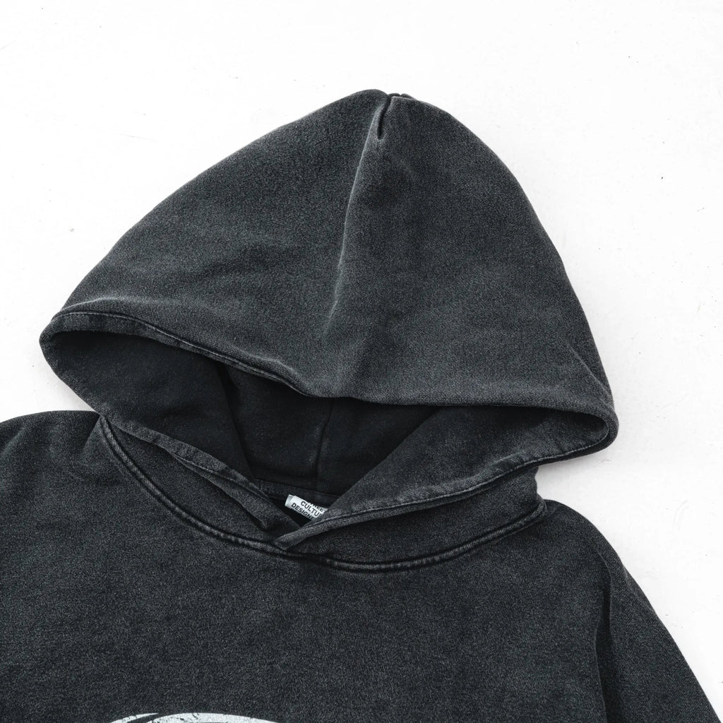 Dark gray hoodie with a brand label on a white background
