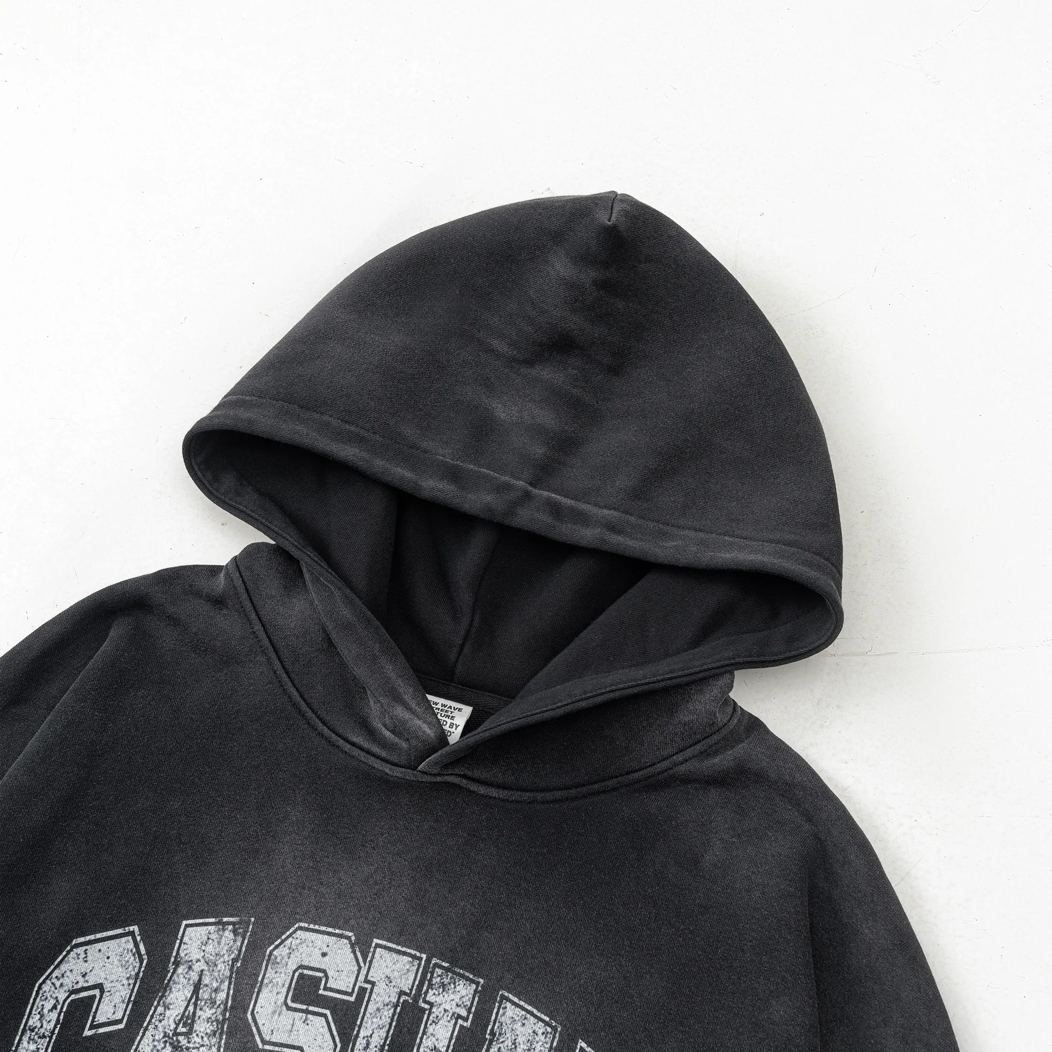 Black hoodie with 'Casual' text on a white background