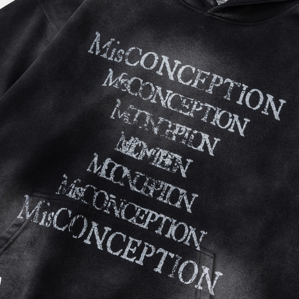 Black hoodie with 'MisCONCEPTION' text repeated in various orientations.