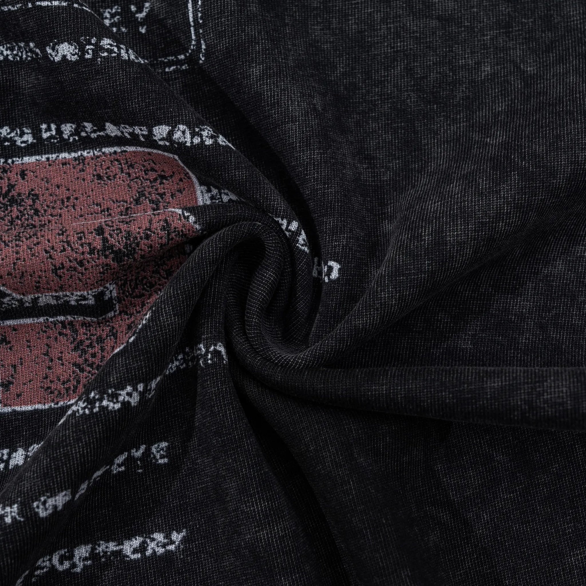 Close-up of dark fabric with printed design