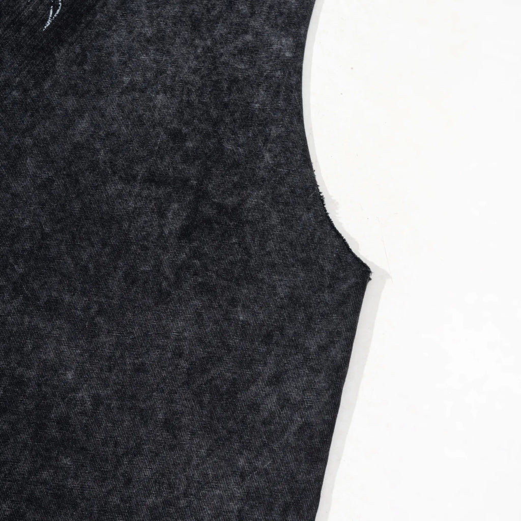 Close-up of a textured black fabric with a white border