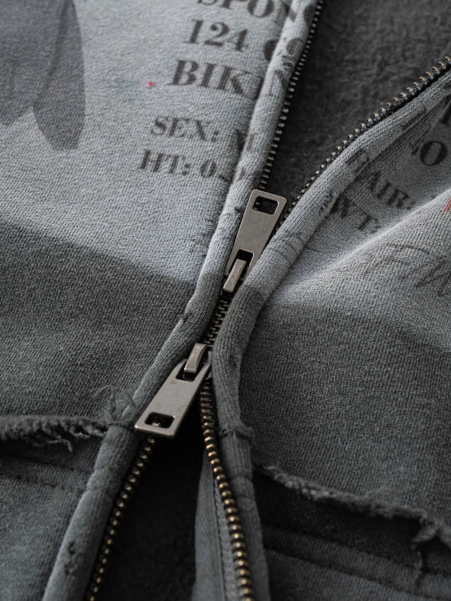 NEW WAVE HOODED RAW EDGE ZIP-UP HOODIE