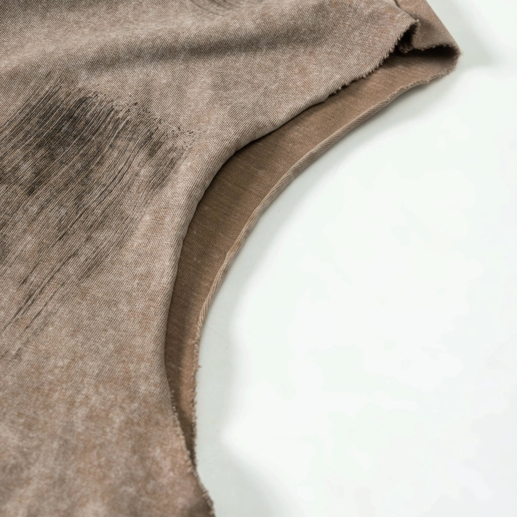 Close-up of brown fabric on a white background