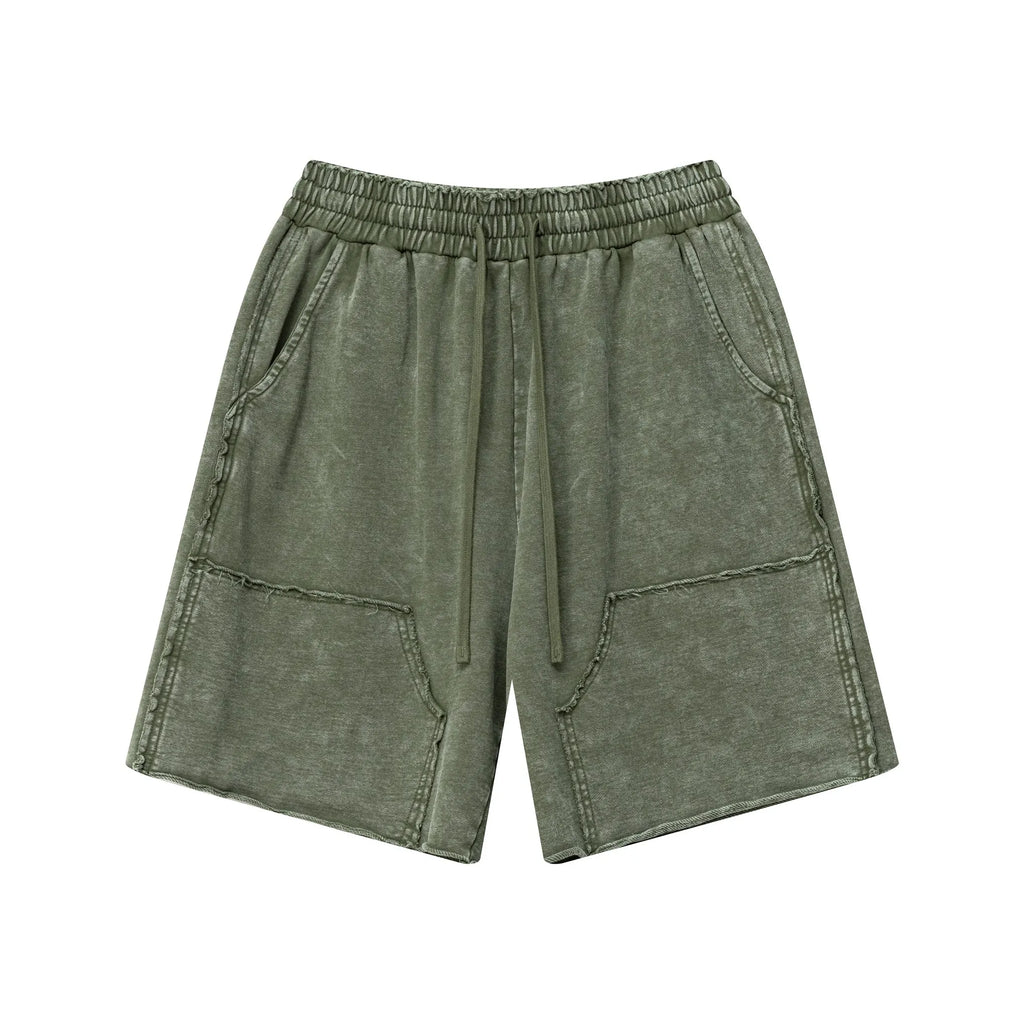 Green shorts with pockets on a white background