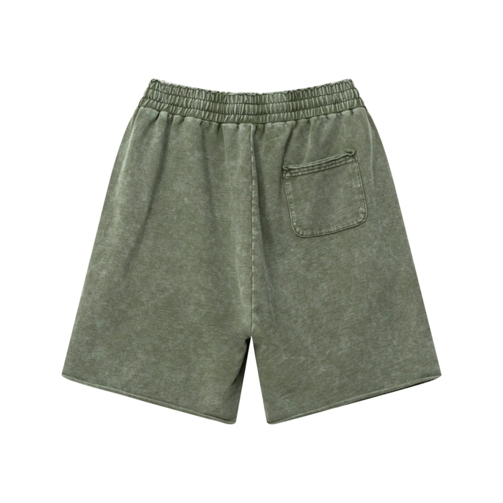 Green shorts with a pocket on a white background