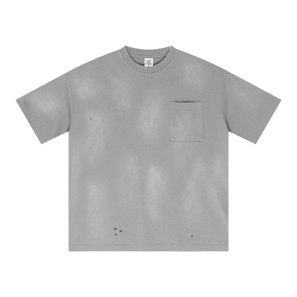 Gray t-shirt with a pocket on a white background