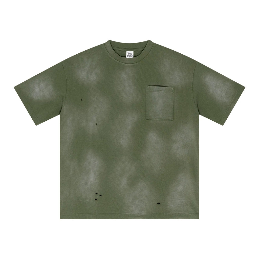 Green t-shirt with a pocket on a white background