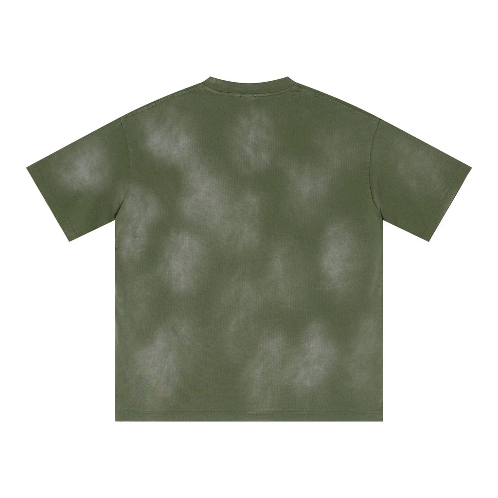 Green t-shirt with a tie-dye pattern on a white background