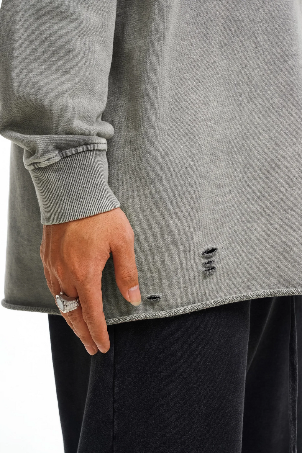 Gray sweatshirt with a distressed detail on a white background