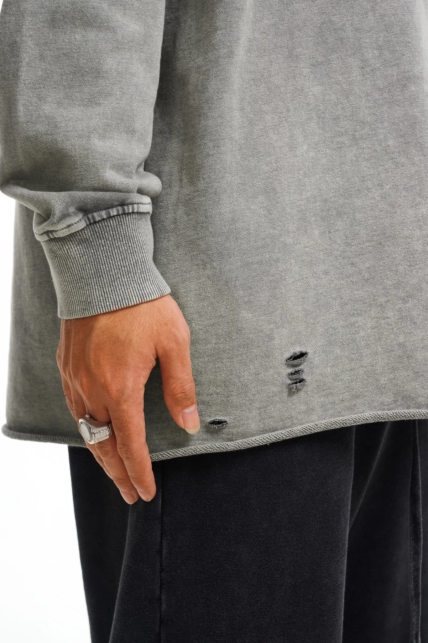 Gray sweatshirt with a distressed detail on a white background