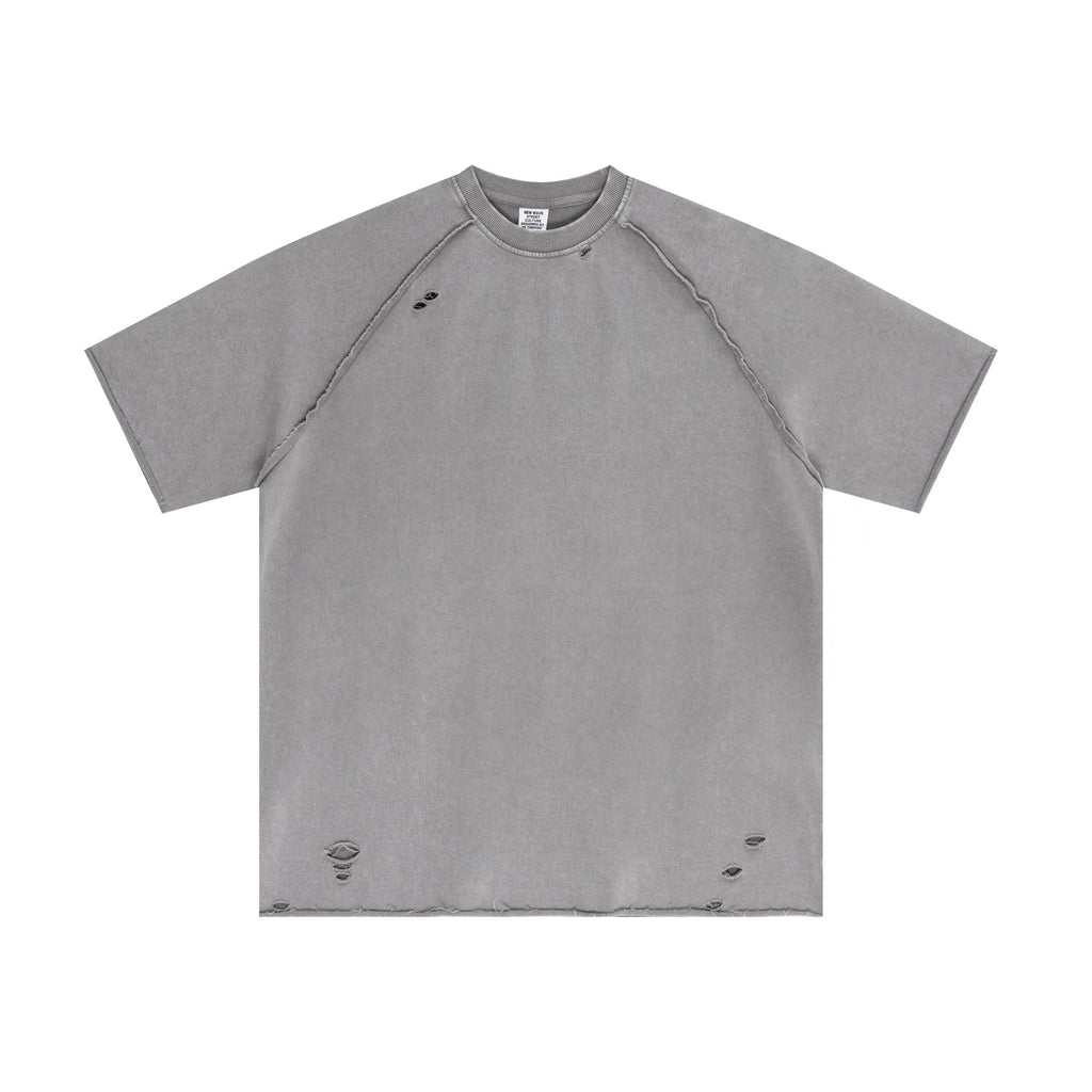 Gray t-shirt with distressed details on a white background