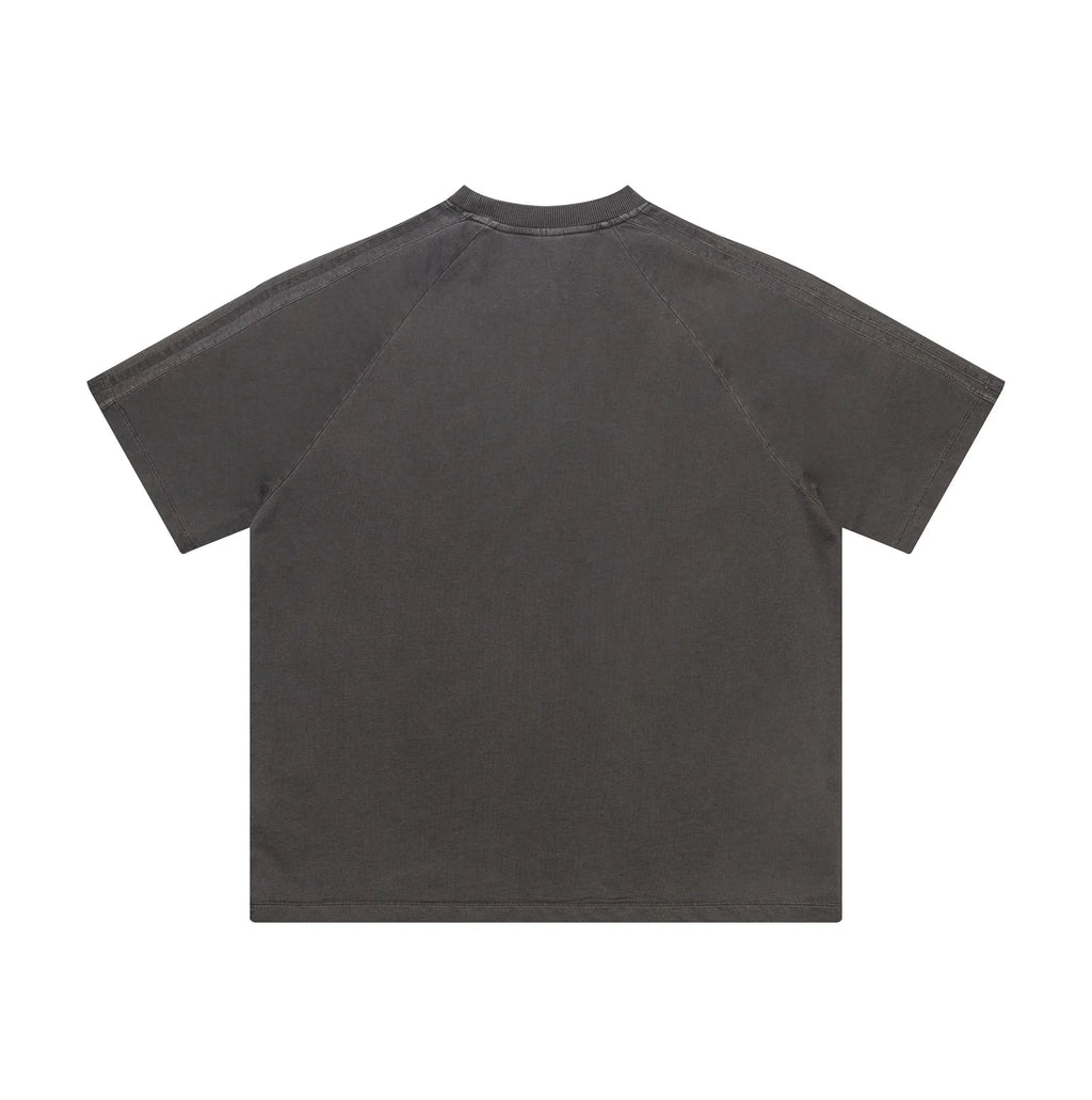 Back view of a plain dark gray t-shirt on a white background