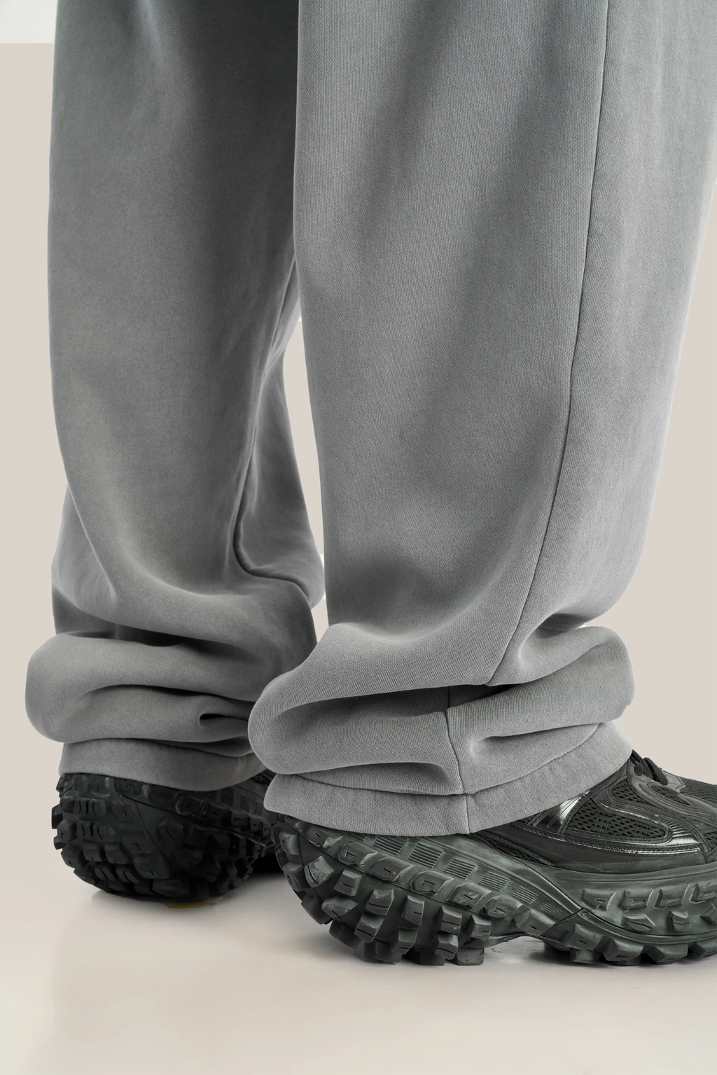 Gray pants and black shoes on a light background