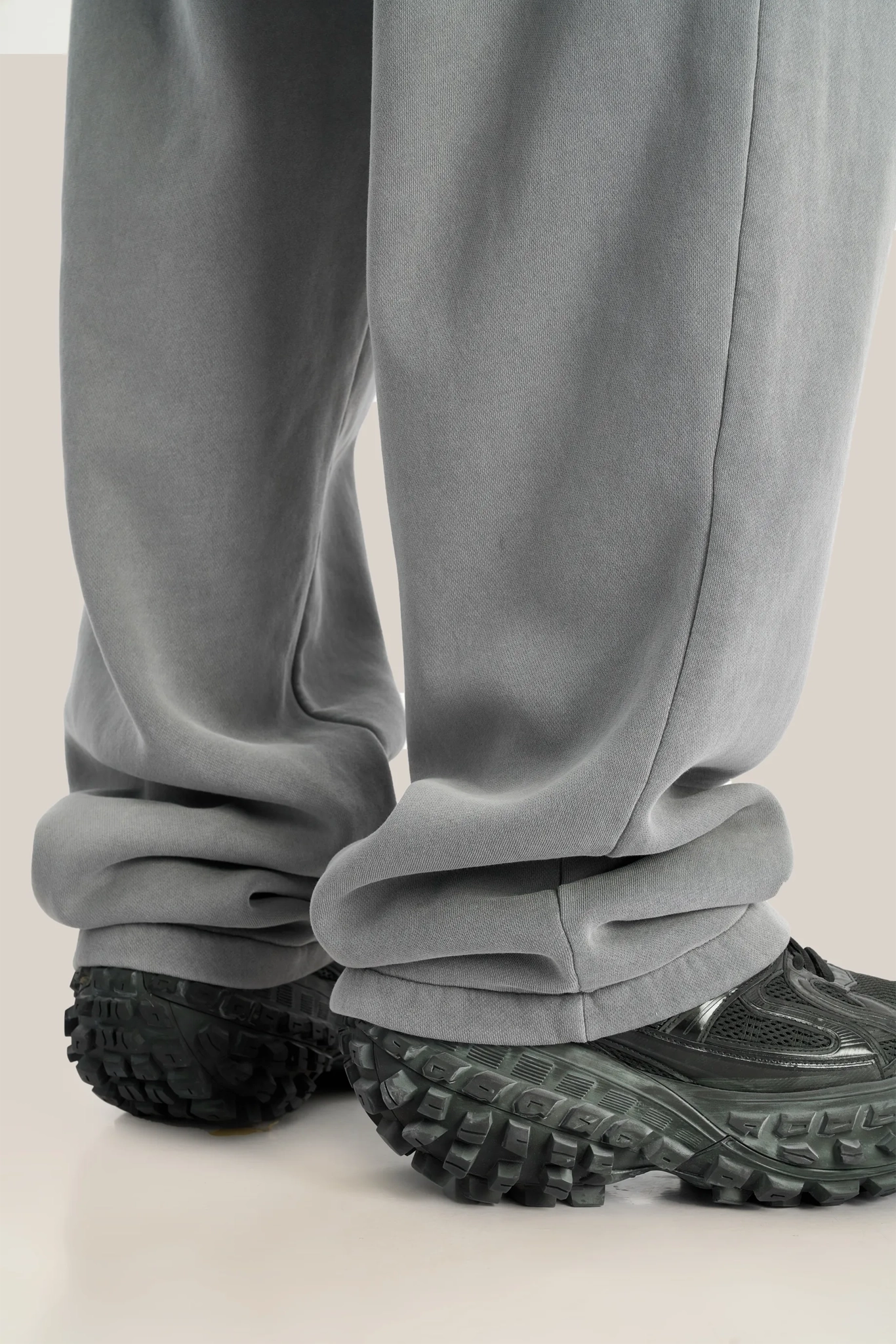 Gray pants and black shoes on a light background