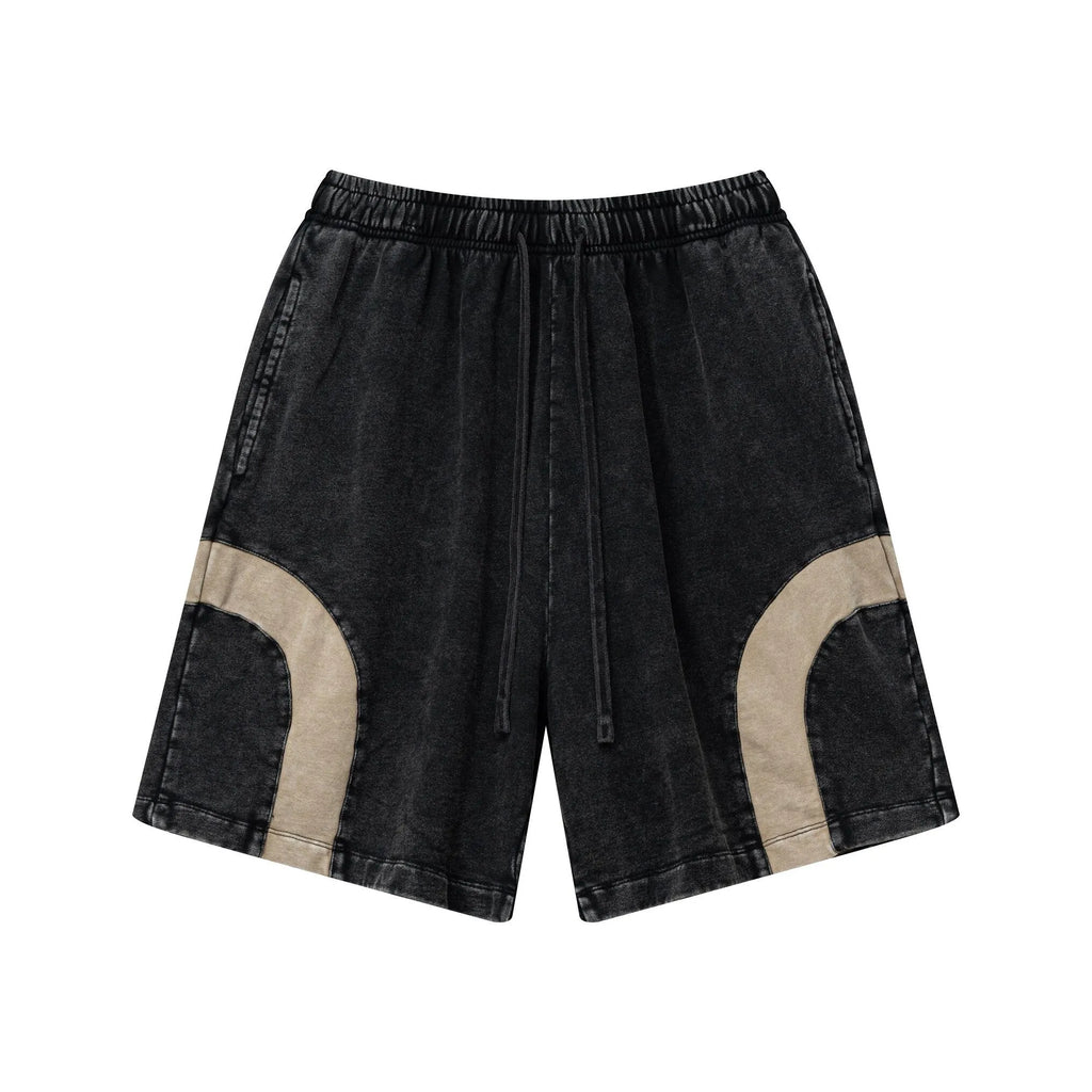 Black denim shorts with beige accents on a white background