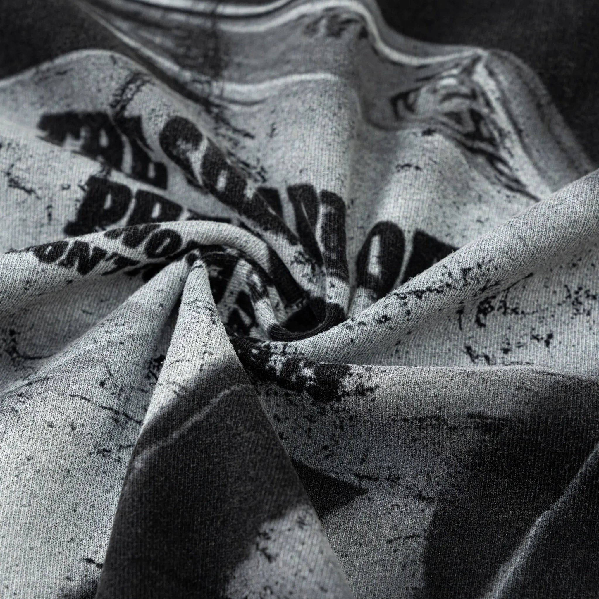 Close-up of textured fabric with printed text and patterns