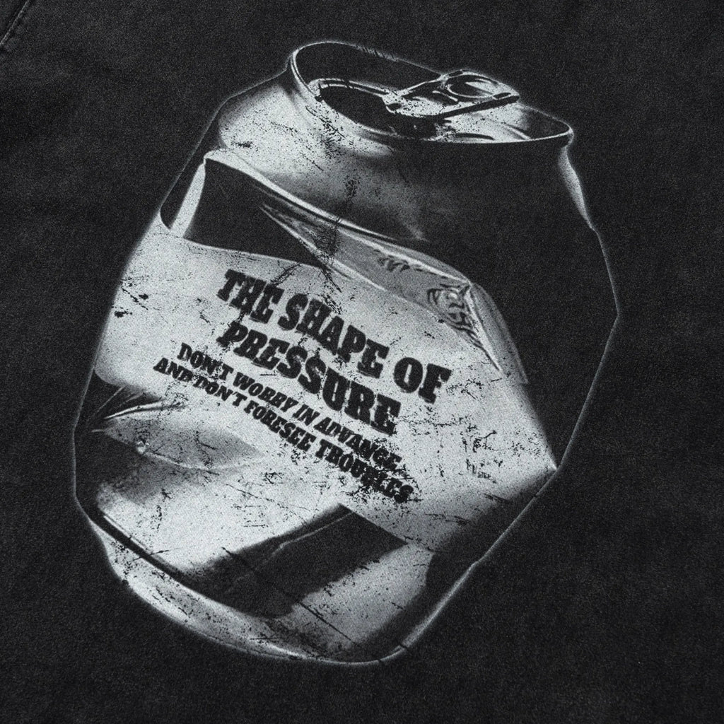 Illustration of a crushed can with text on a black background