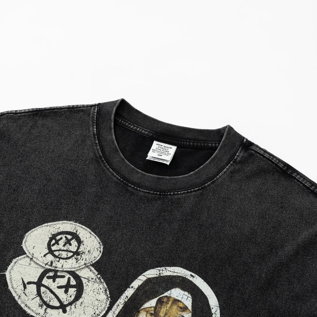 Black t-shirt with graphic design on a white background