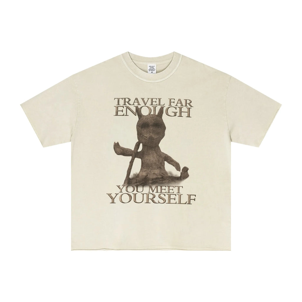 Beige t-shirt with a graphic of a person meditating and text on a white background